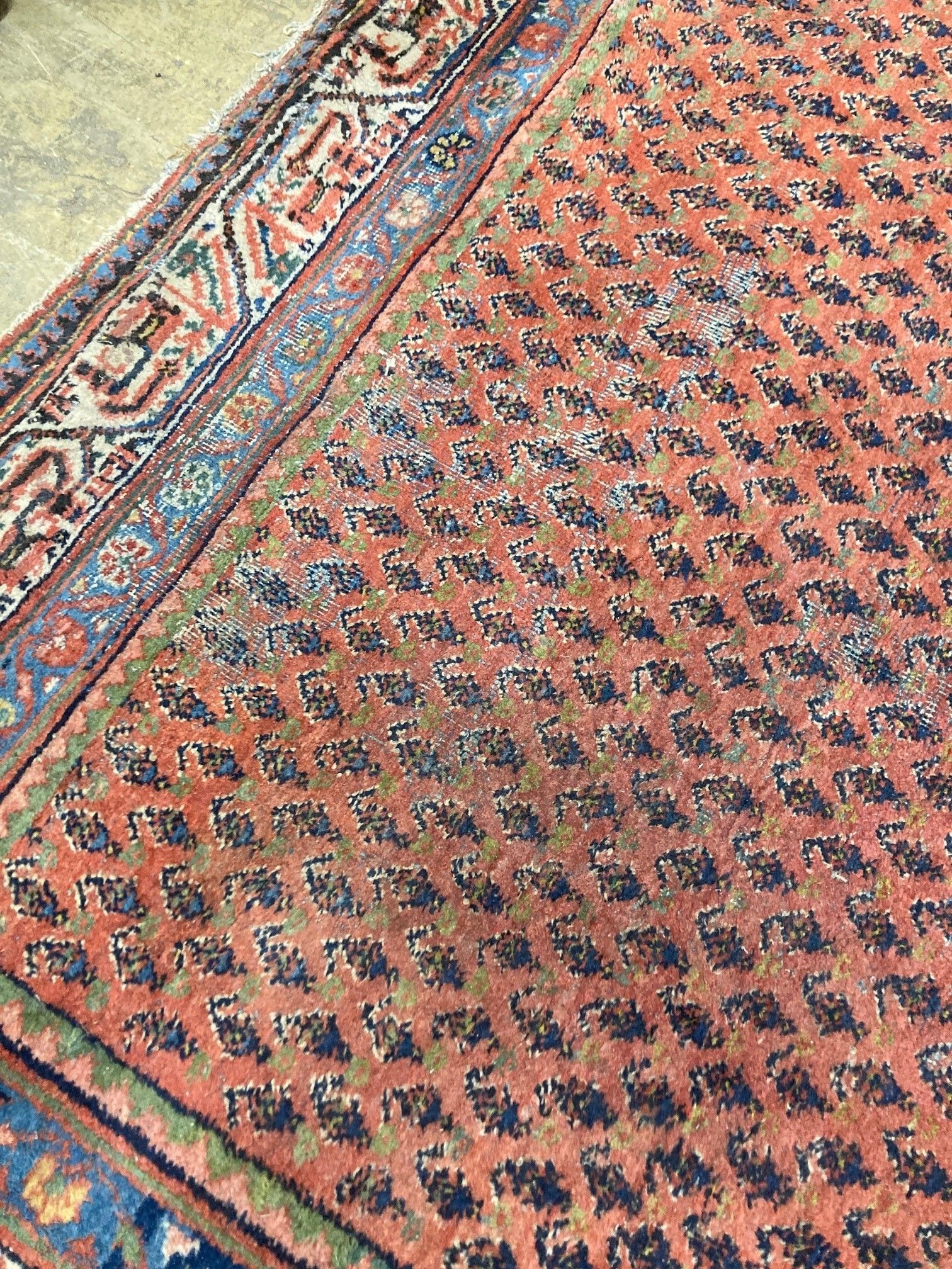 A Feraghan red ground carpet, 314 x 217cm